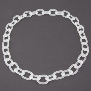 Necklace made from frosted links of clear glass. Photographed lying flat on a dark background.