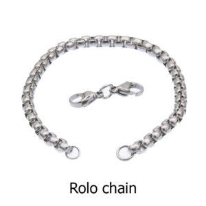 Chunky stainless steel rolo belcher chain with double lobster clasps. The clasp is detached from the bracelet showing the large and small jump rings at the ends of the chain. Text reads "Rolo chain"