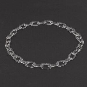 Clear glass link chain sitting on a dark background.