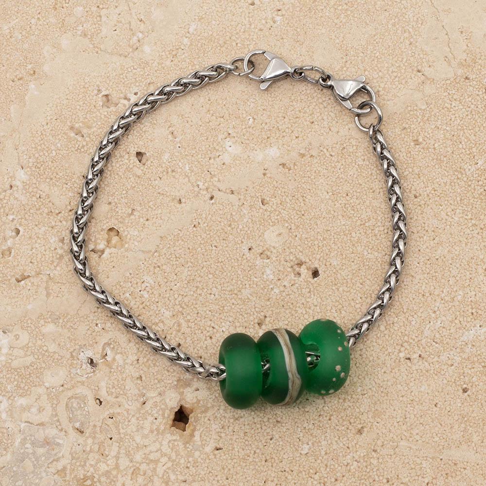 3 frosted green glass beads with big holes on a stainless steel chain bracelet with double lobster clasp fastening.