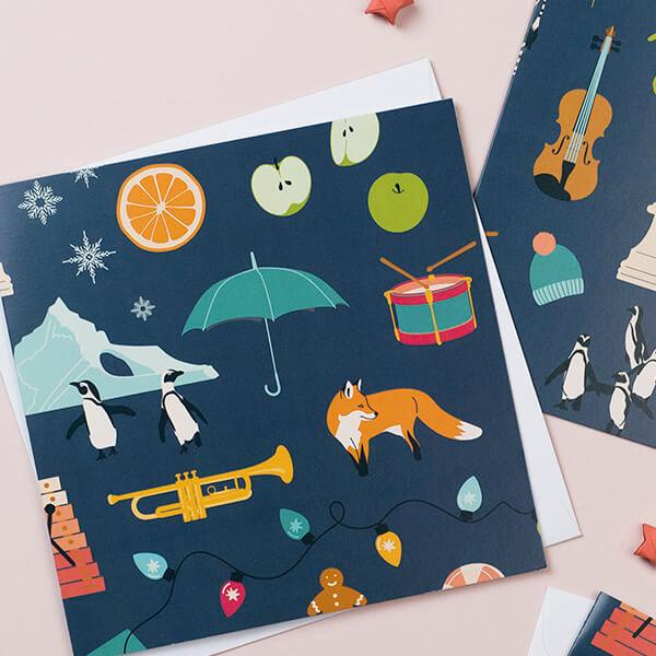 Christmas themed illustrated cards and envelopes