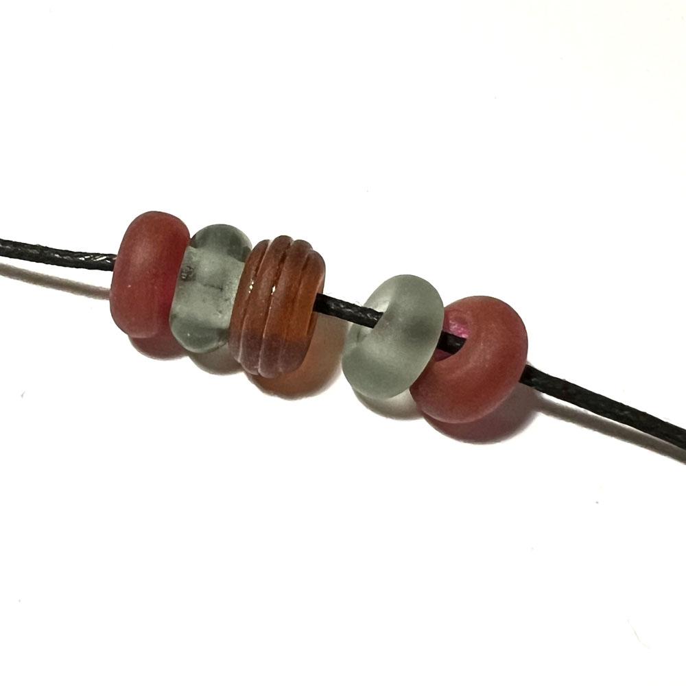 five big holes beads in pink, grey and orange