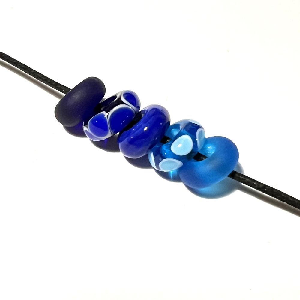 five big holes beads in assorted blues