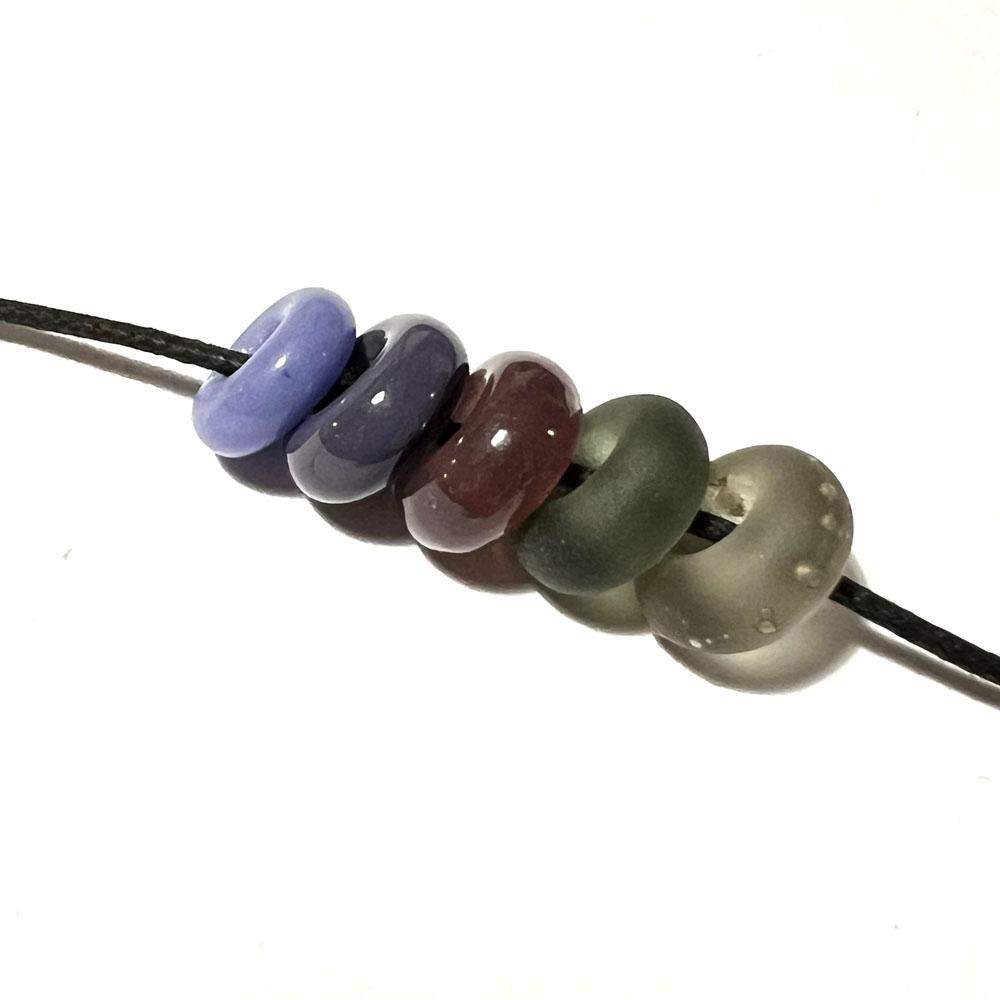 five big holes beads in purples and greys