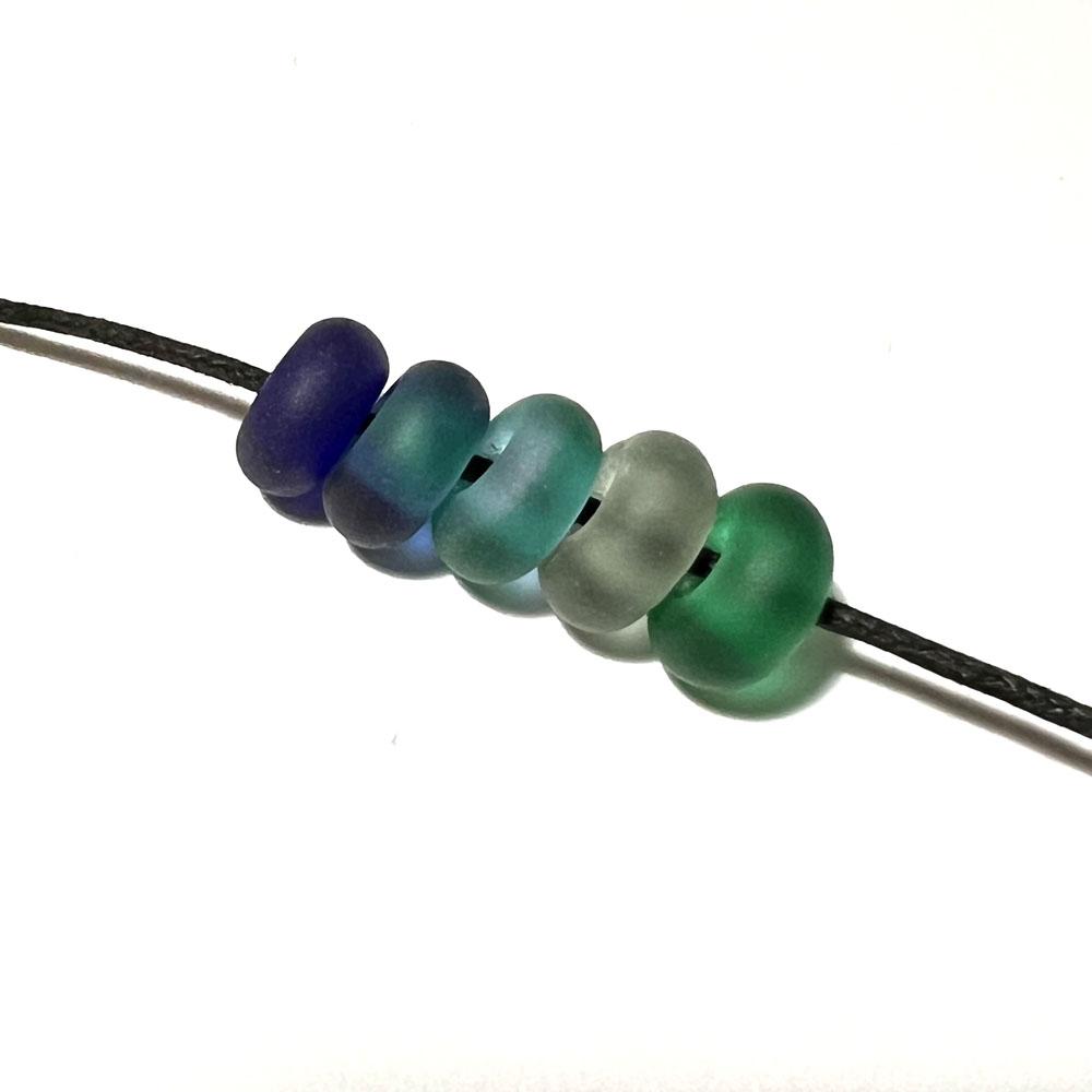 five big holes beads in blues and greens